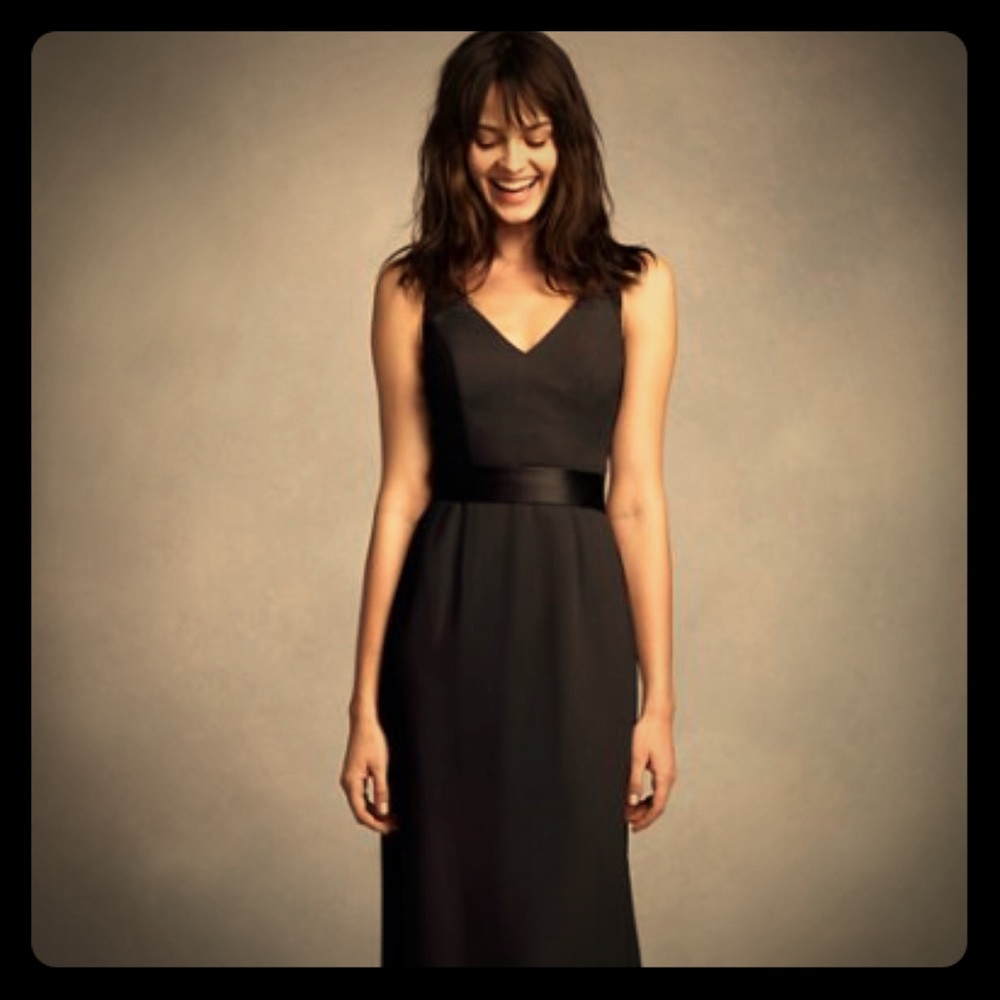 White by Vera wang. Long v neck crepe gown.